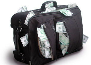 Travel luggage full of foreign currency