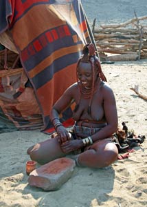 Namibian Himba woman preparing otjize
