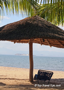 Beach chair under sun umbrella in Zanzibar Tanzania