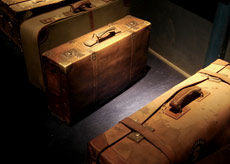 Old luggage bags on luggage carousel