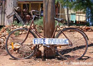 Bicycle parked against lamp post