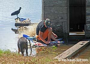 Preparing food on the banks of Amazon river