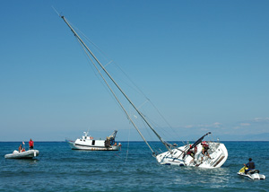 Small boat sinking after accident at sea