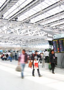 People walking around in an airport termial