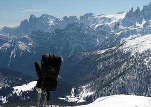 Skiing gloves on top of ski poles