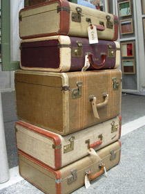 Stack of five old luggage bags
