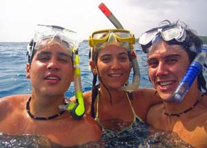 Three travelling teenagers scuba diving