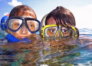Two kids snorkelling