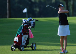 Woman playing golf